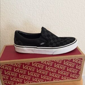 Vans Black Checkered Classic Slip-Ons